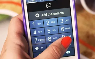 Phone keypad in hand